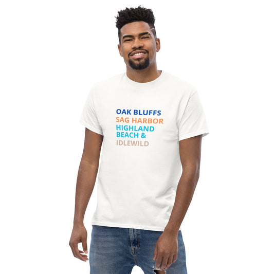 Black man wearing Asali Origins vintage vacation t-shirt