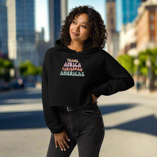 woman wearing a black cropped hoodie in the city